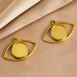 Gold evil eye bezel pendants detail shot, stainless steel DIY jewelry making accessories.