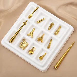 Vergoldete edelstahl anhänger set, verschiedene süße mini anhänger designs für schmuck.