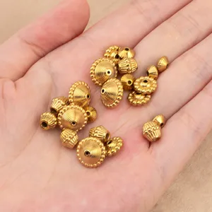 Perles espacées toupie en acier inoxydable doré accessoires de fabrication de bijoux DIY.