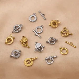 Close-up of assorted stainless steel toggle clasps, ideal for DIY jewelry making details.