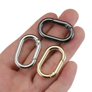 Alloy bag hardware oval spring ring carabiner keychain accessory for DIY luggage crafting.