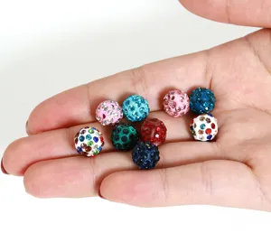 Close up of 10mm colourful rhinestone clay Shamballa beads, perfect for DIY jewelry making.