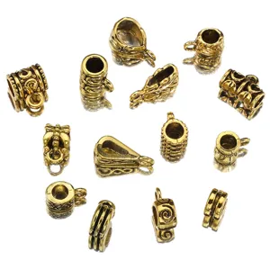 Connecteurs breloques pendentifs perles DIY or ancien pour fabrication de bijoux.