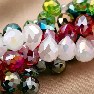 Close-up detail of sparkling faceted crystal beads, brilliant colorful refraction for DIY.
