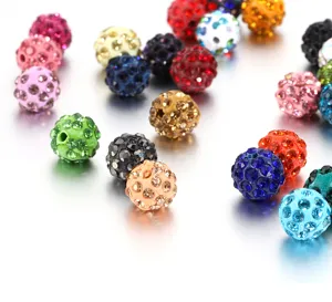 Detailed close-up of 10mm rhinestone Shamballa clay beads, perfect for DIY jewelry making.