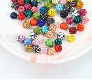 Detailed view of 10mm rhinestone clay beads, colorful sparkling Shamballa balls for DIY jewelry making.