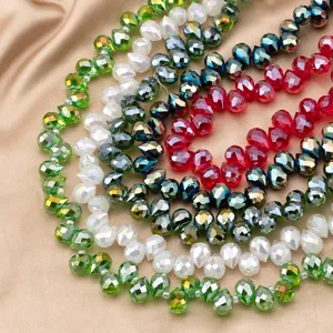 Faceted crystal beads detail shot, multi-color sparkling loose beads for DIY jewelry making.