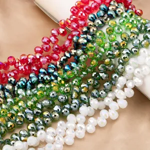 Faceted crystal loose beads detail close-up, sparkling glass strands for DIY jewelry making