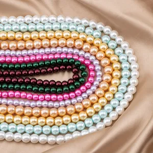 Colorful imitation pearl loose beads close up detail for DIY handmade accessories.