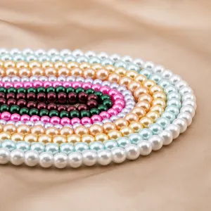 Colorful faux pearl round beads detail shot, perfect for DIY jewelry crafting projects.
