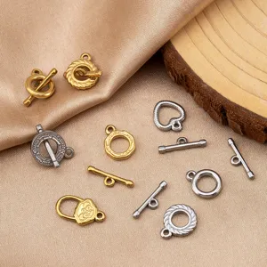 Close-up of 304 stainless steel heart and round OT clasps for DIY jewelry making parts.