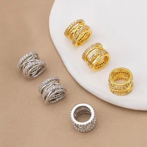 Close-up of micro-pave cubic zirconia barrel spacer beads detailing for DIY jewelry accessories.