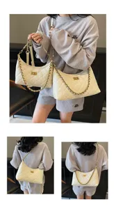 Detailed view of the women's quilted chain shoulder bag, showcasing elegant style and texture.