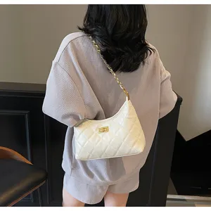 Detailed view of the women minimalist quilted chain shoulder bag, elegant white hobo design.