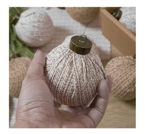 Rustic fabric Christmas tree hanging ball ornament with bronze cap for holiday decor.