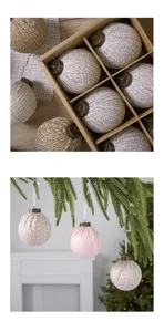 Detailed view of fabric Christmas ball ornaments with tweed texture for tree hanging decor.
