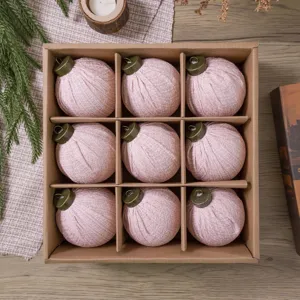 Set of 9 pink fabric Christmas baubles with vintage metal caps for holiday tree home decor.