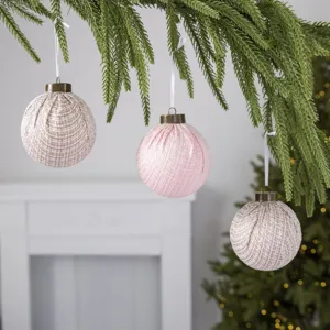 Tweed fabric Christmas ball ornaments hanging for holiday tree decoration and festive vibe layout