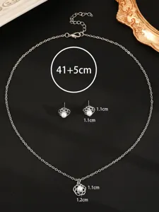 Zilveren parel ketting en oorbellen set, delicate holle bloem hanger, stijlvolle sieraden.