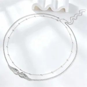 Silberne mehrlagige Taillenkette mit zarten Engelsflügeln und Perlen für Damen im Urlaubsstil.