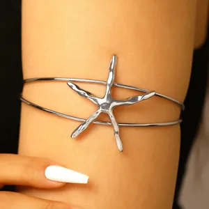 Silver starfish arm cuff, metal open upper arm bracelet, beach vacation fashion jewelry.