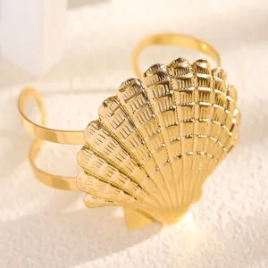 Gold seashell open cuff arm bracelet, stunning marine ocean style metal armlet jewelry for beach.