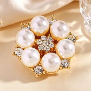 Exquisite floral collar button with faux pearls and sparkly rhinestones, elegant clothing decor.