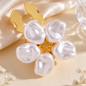 Elegant floral collar clip with baroque pearl petals and gold stamen design for chic apparel.
