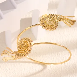 Gold open arm cuff bracelet featuring beach conch and marine elements for women style.