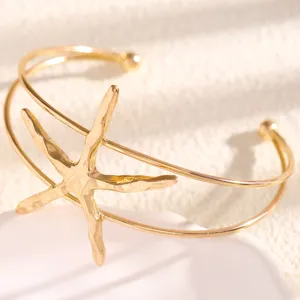 Gold starfish open arm cuff bracelet beach resort style adjustable upper arm jewelry