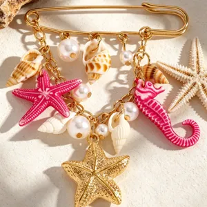 Spilla con conchiglia e stella Marina stile vacanze estive, spilla dorata con perle.
