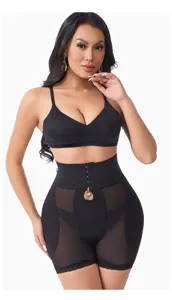 Detail shot of high-waist black shapewear with tummy control and breathable mesh panels.
