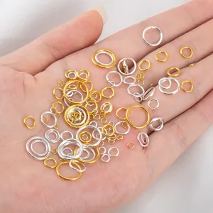 Gold and silver open jump rings detail showing mixed sizes for DIY jewelry crafting accessories.