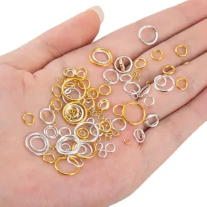 Mixed gold and silver open jump rings displayed on hand, ideal for DIY jewelry making craft.