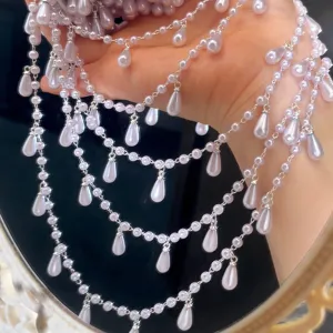 Gedetailleerd weergave van meerlagige druppelvormige nepparel kwastkettingen voor DIY sieraden.
