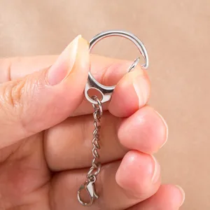 Metal keychain ring with chain and lobster clasp, perfect for DIY crafts and doll pendants.