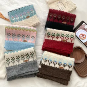 Cozy winter knitted scarf with Fair Isle pattern, thick warm winter accessory detail view.