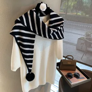 Knit striped triangular scarf with pompom and white sweater set for women winter warm.