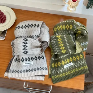 Cozy winter knit Fair Isle scarf with soft wool blend texture, warm neck warmer for women.