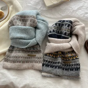 Thick knitted winter scarf with classic fair isle pattern, cozy warmth for women daily wear.