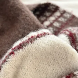 Cozy thick knit winter scarf detail shot, classic Fair Isle pattern, soft warm wool blend.