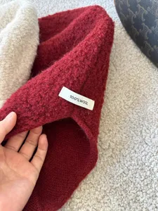 Cozy 100% wool balaclava winter knit hat detail showing soft fleece texture and warm design.