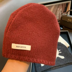 Womens 100% pure wool knit beanie hat, winter warm cozy slouchy cap for cold weather fashion.