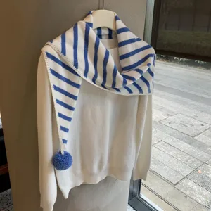 Blue and white striped knitted triangular scarf with cute pom pom warm winter fashion accessory