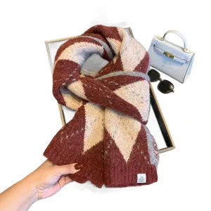 Knitted argyle scarf for women, winter warm neck wrap with geometric pattern, cozy stylish wear.