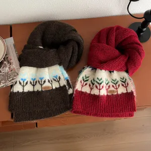 Detailed view of cozy winter knit scarf with Nordic Fair Isle pattern in rich colors.