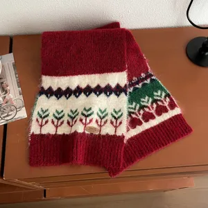 Christmas Fair Isle red knit winter scarf for women, cozy thick warm woolen tassel shawl detail.
