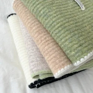 Cozy soft knitted winter scarf with contrast edge design, perfect daily warm accessory.