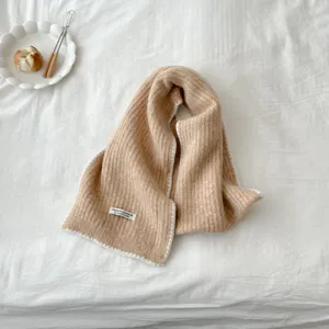 Cozy winter knitted scarf with white contrast trim, soft warm solid color neck warmer.