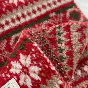 Cozy winter Fair Isle knitted scarf with thick warm retro jacquard pattern for women.